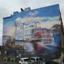 A mural of a steamboat.